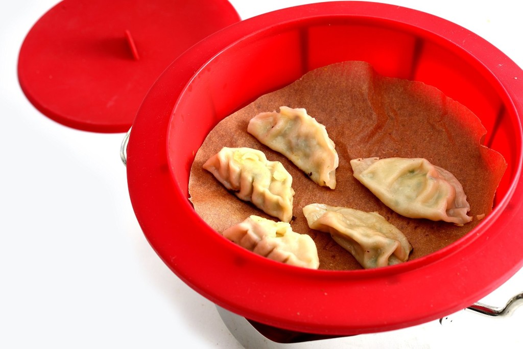 Dim sum dumplings in Norpro red silicone steamer insert